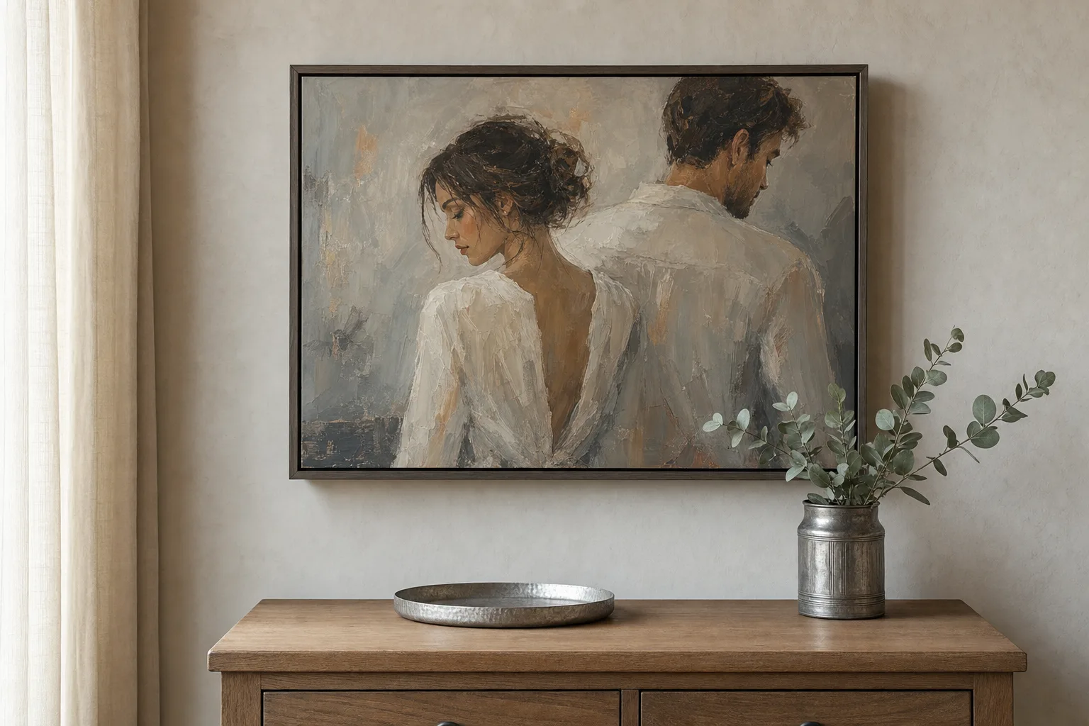A framed couple portrait on a styled wall — the keepsake for a tenth wedding anniversary.